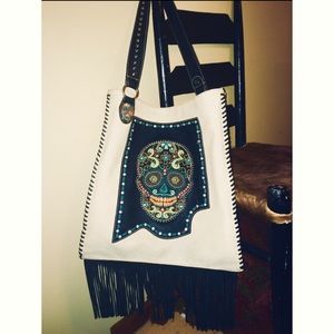 Leather purse with fringe